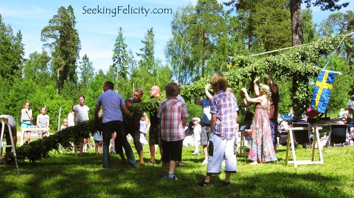 Setting up the maypole flag for the midsummer celebration!